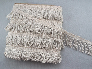 Franjuri poliester 5.8cm/11m ivoire