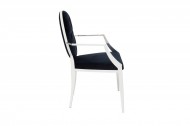 MODERN BAROCK fauteuil combineert symbiose van roestvrij staal en hoogwaardig zwart fluweel met knopen