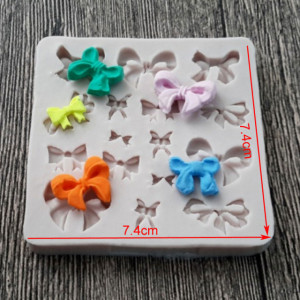 papillon e fiocchi per decorazioni delle torte