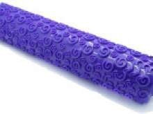 Mattarello decorativo a spirali.