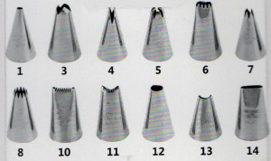 Set di 12 cornetti o beccucci in acciaio Inox.