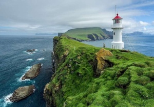Papier peint - phare sur une petite île verte - 13020