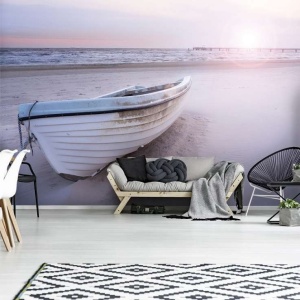 Bateau sur une plage de sable au coucher du soleil - 13050