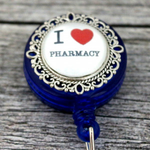 Accesoriu retractabil pentru ecuson cu mesaj pentru farmacist (M2)