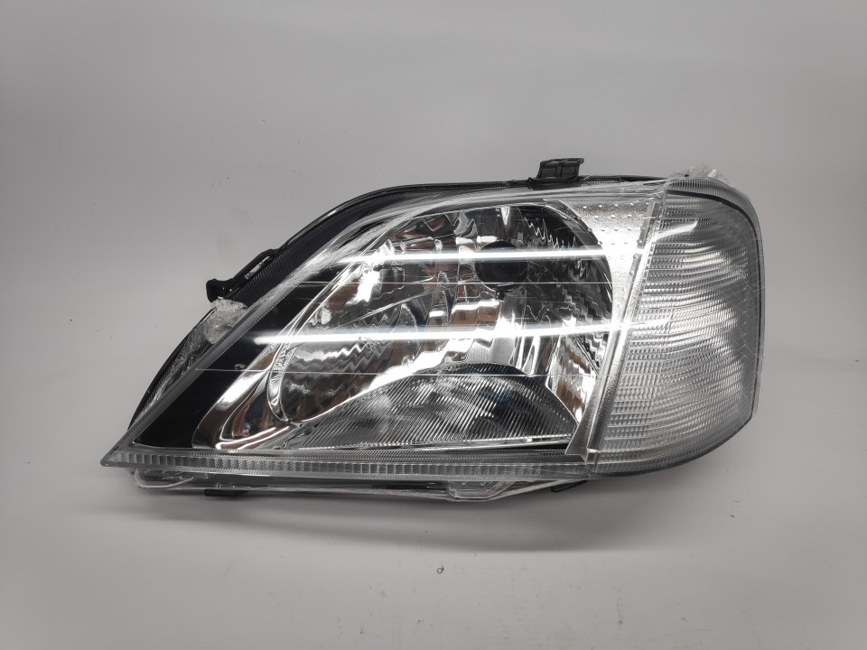 Peça - Farol Esquerdo Eletrico Dacia Logan 04-08