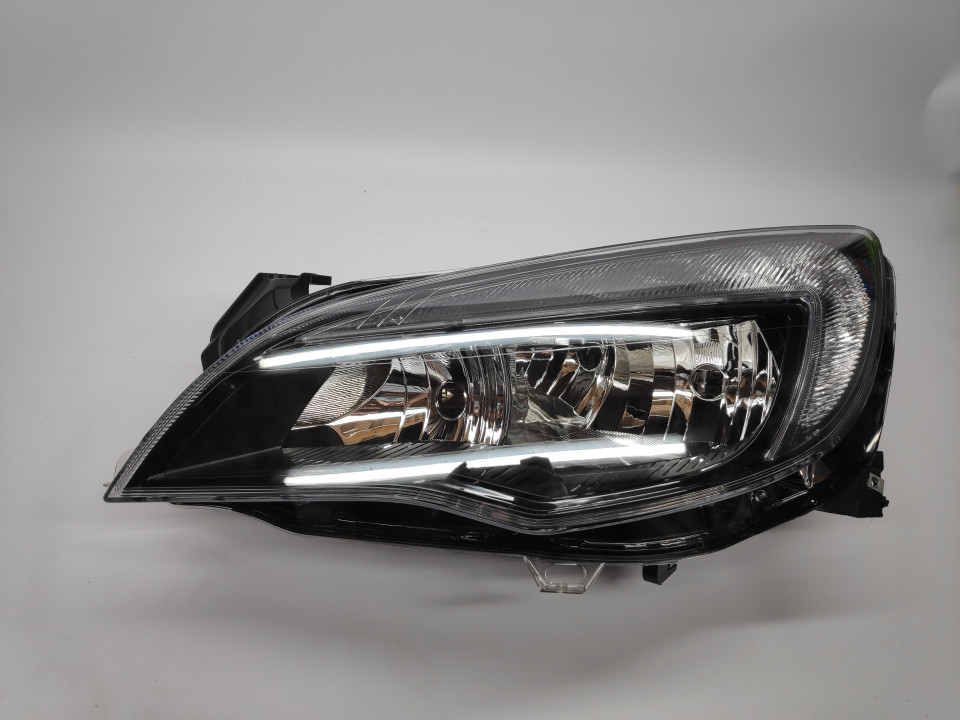 Peça - Farol Esquerdo Opel Astra J 5P/ Sports Tourer 10-16