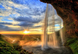 Gorgeous waterfall and sunrise in the background- 13056