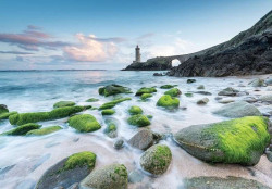 Lonely beach with lighthouse in the background - 13052