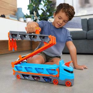Camion si pista de masinute Hot Wheels-Speedway Hauler cu trailer si 3 masinute
