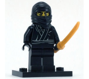 col01-12 Ninja, zwart met parelgoud ninja zwaard en standaard NIEUW *0M0000