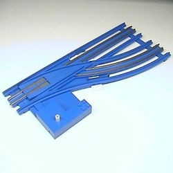sw12v1right-7G Trein, Rails 12V handwissel mdet electrische geleiding rechts blauw gebruikt *