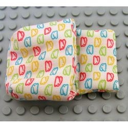 sleepbag07-1G DUPLO slaapzak met blauwe, lime, rode en gele konijntjes wit gebruikt *
