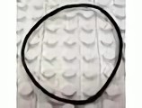 x138-11G Rubber bandje`(5 nops doorsnede) geel gebruikt *0K001