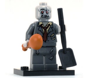 col01-5 Zombie met schop , drumstick (lang) en voetstuk NIEUW *0M0000
