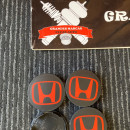 Centros de Jantes Honda 68mm pretos e vermelhos