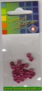 Eyelets donkerroze 25 stuks nr. 20407/12 (Locatie: 1B )