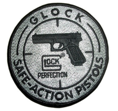 Petic GLOCK Safe Action rotund cu un diametru de 90 mm.
