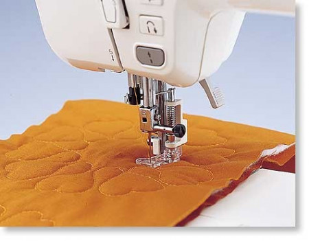Piciorus pentru acoperirea rupturilor de material (stopare), matlasare cu linii curbe sau broderie manuala