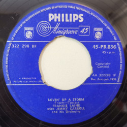 Frankie Laine ‎– сингъл Lovin' Up A Storm / A Kiss Can Change The World