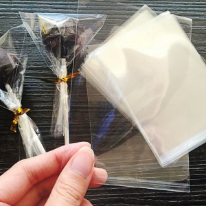 Set de 200 pungi cu arcuri de celofan pentru dulciuri JZK, plastic, transparent, 8 x 12,5 cm