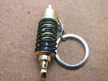 Porta Chaves - Amortecedor com mola - Dourado