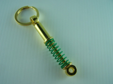 Porta Chaves - Amortecedor Dourado/Verde