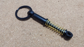Porta Chaves - Amortecedor Preto/Dourado