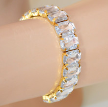 Bracciale cristalli trasparenti donna elastico a molla oro polsiera estensibile bracelet pulsera X95