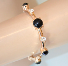 Bracciale donna oro dorato cristalli pietre neri strass rigido elastico a molla bracelet CX26