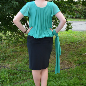 Rochie glamuroasa, de culoare turcoaz-negru, maneci scurte