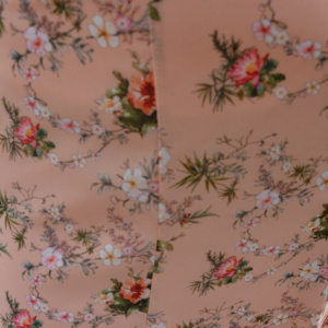 Fusta lejere, midi, nuanta de piersica, cu imprimeu floral multicolor