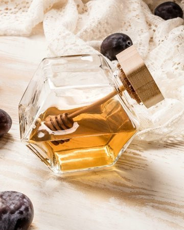 Borcan pentru miere hexagon cu bagheta de lemn dispenser pentru miere