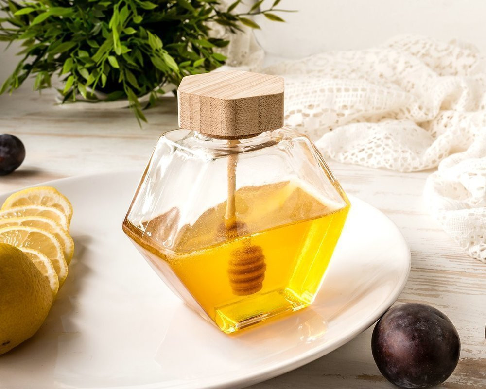 Borcan pentru miere hexagon cu bagheta de lemn dispenser pentru miere