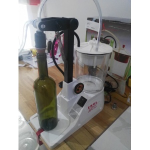Enolmatic - aparat de imbuteliere cu vacuum