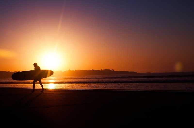 Tablou Multicanvas Surfing la Apus